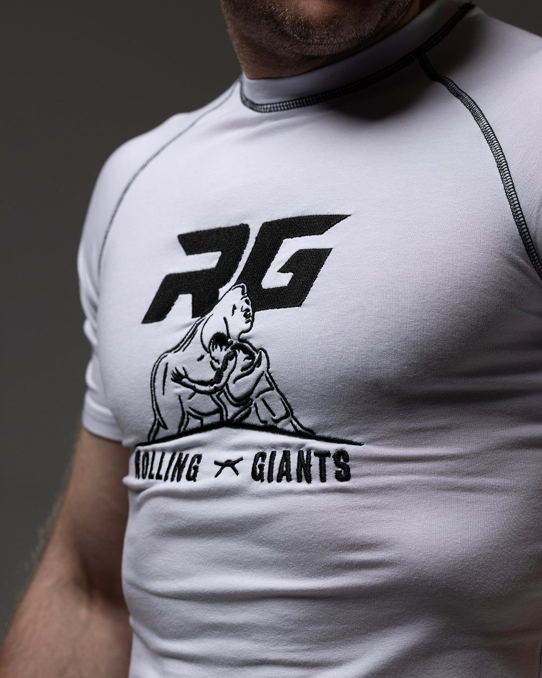 White RG NaturaFlex™ rash guard by Rolling-Giants, short sleeve shirt with a snug fit and smooth fabric for active sports.